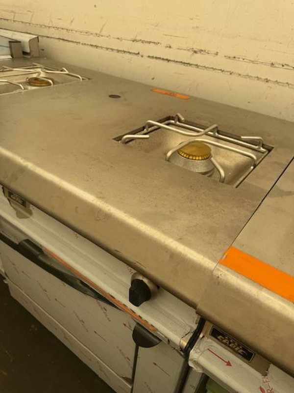 Stainless steel cooking bench with gas burner