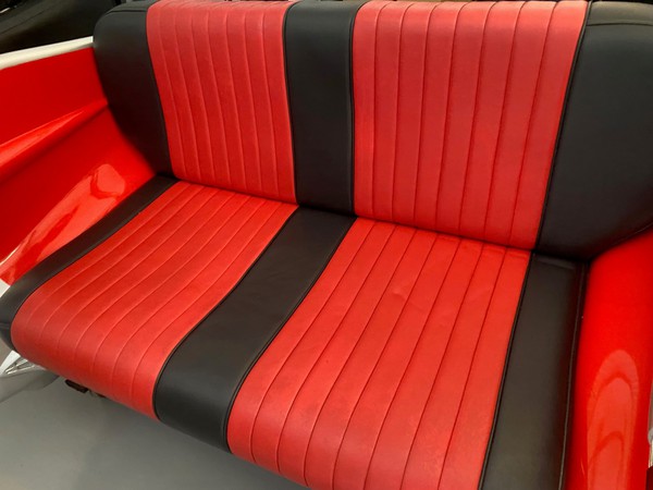 1959 Cadillac Sofa with red and black uphostery