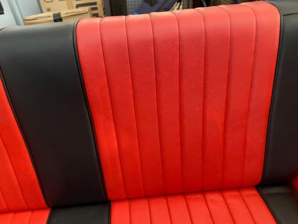 1959 Cadillac with red and black upholstery