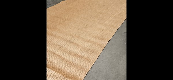 Rolls of Dandy Dura matting in Harvest Gold.