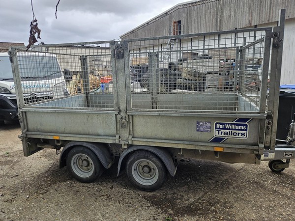 Trailer with caged sides