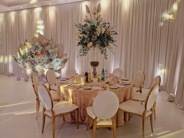 White and Gold Dior Chairs