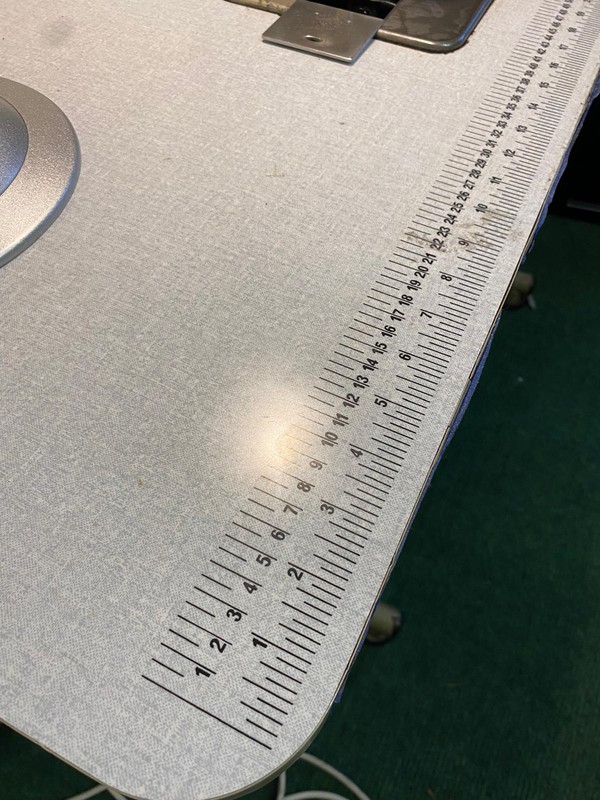 Sewing table with ruler