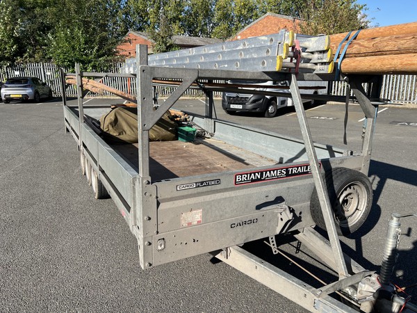 Drop side trailer with ladder / pole rack