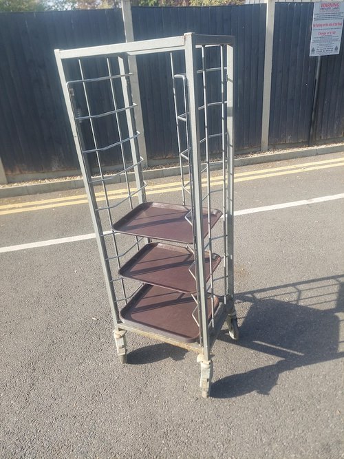 Catering clearing trolley with plastic trays