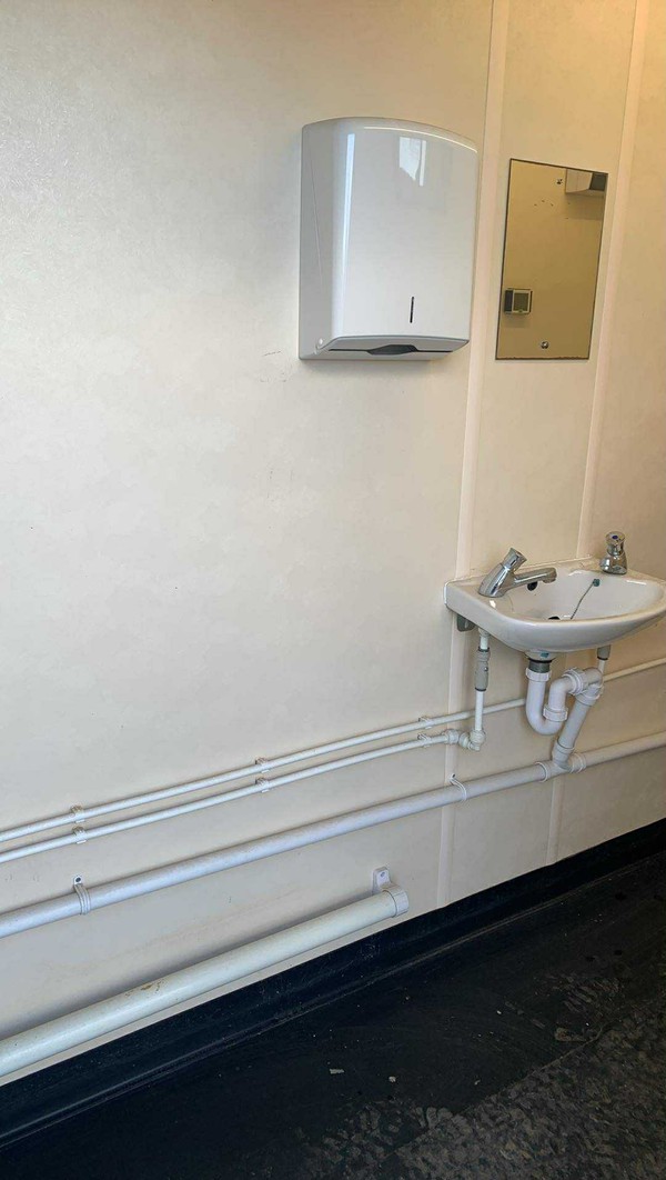 Used Toilet Black And Shower