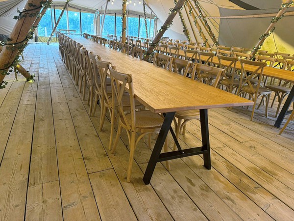 Long wooden tables made from oak