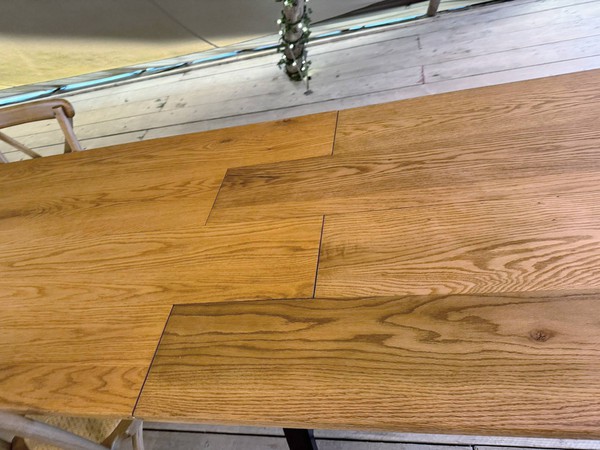 Plank top oak trestle tables