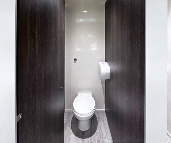Toilet cubicle from a 3 + 1 Luxury toilet trailer