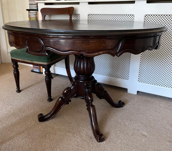 Carved pedestal table with cabriole legs Carved pedestal table with cabriole legs