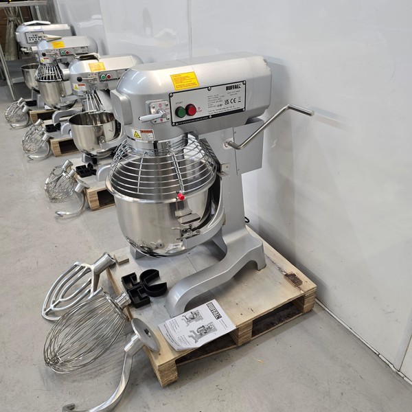 Mixer with whisk, beater and dough hook