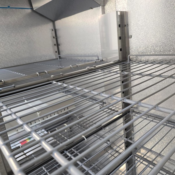 Double door freezer with wire shelves