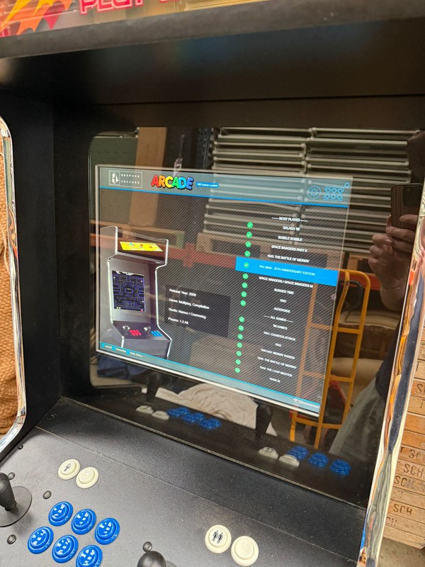 Reprogrammable arcade game