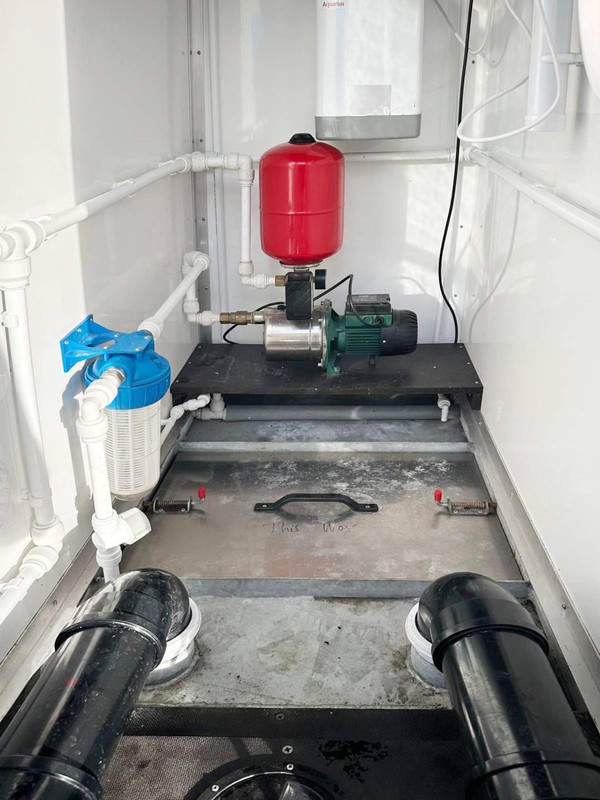 Toilet trailer service cupboard