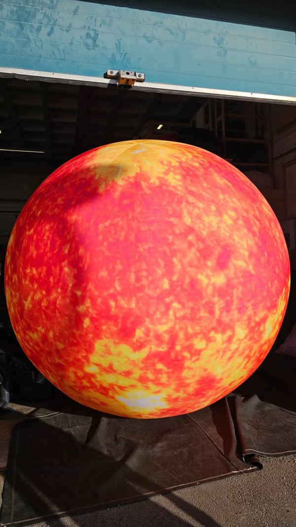 Inflatable sun event prop