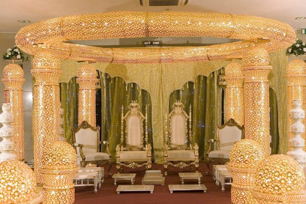 Gold Metal Mandap with wedding chairs Gold Metal Mandap with wedding chairs