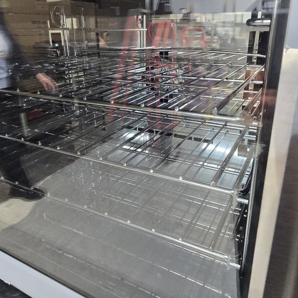 Electric oven with glass door