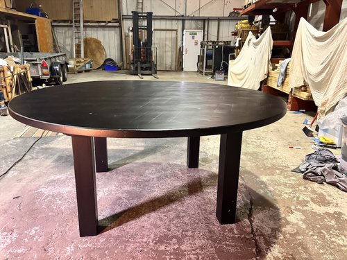Large round table with detachable legs