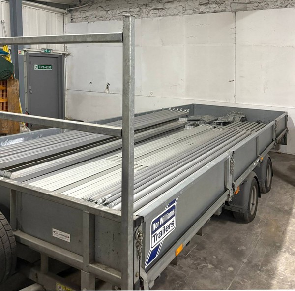 Framed marquee loaded on Ifor Williams trailer