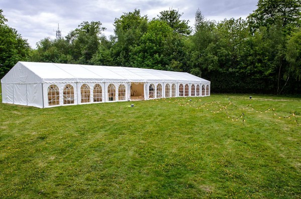 Nearly new 9m x 27m framed Tectonics marquee