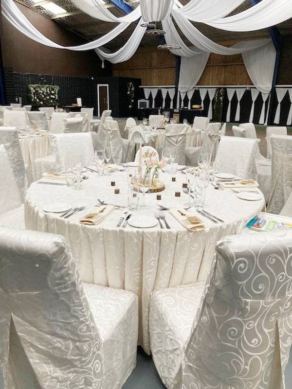 Ivory chair covers and table cloths