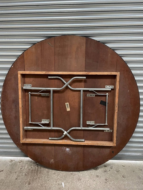 5' 6" round table with American legs and stacking battens 5' 6" round table with American legs and stacking battens