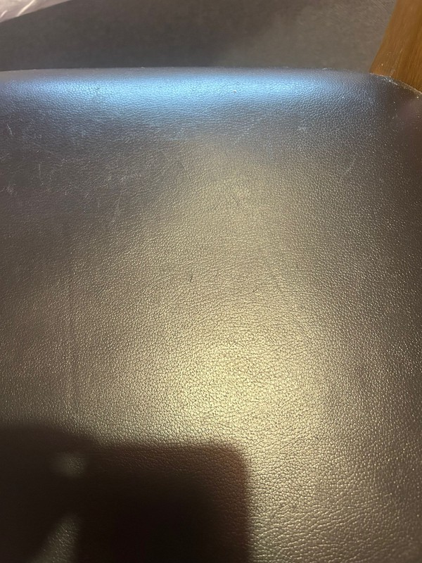 Black Faux leather and oak chairs