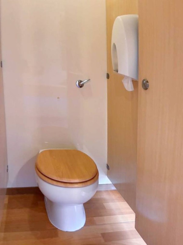 Clean white and wood toilet trailer Clean white and wood toilet trailer