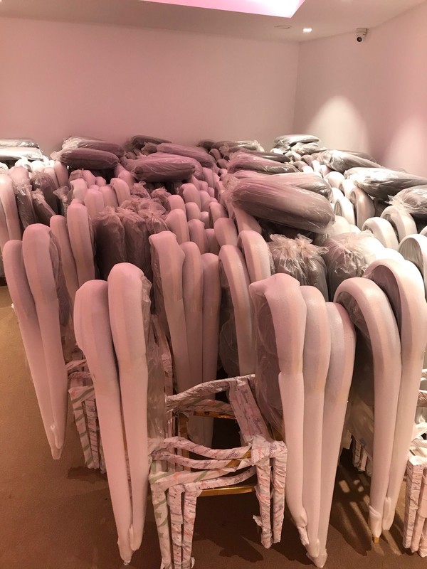 Dior chairs in packaging