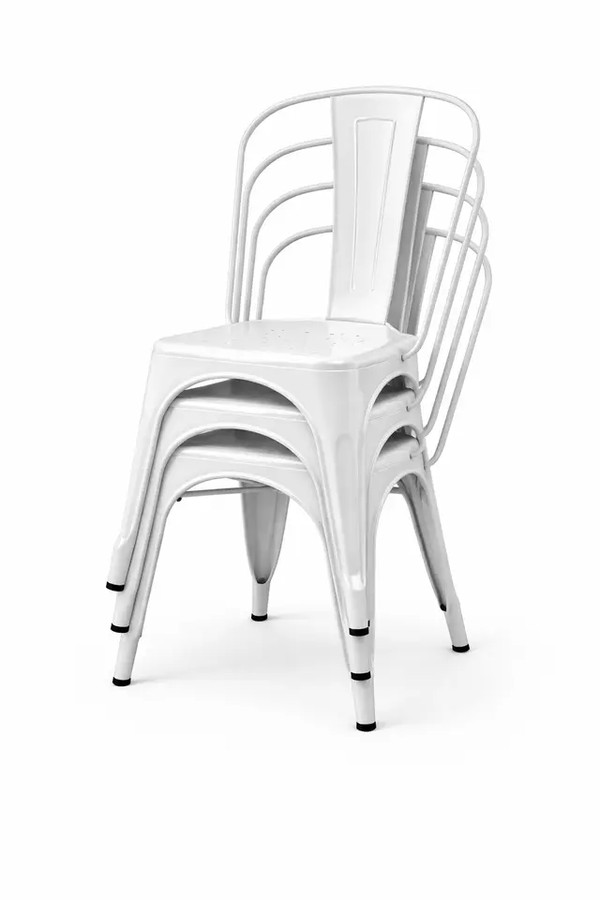 Stacking white Tolix chairs