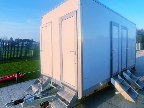 Used muli bay 7 cubicle toilet trailer