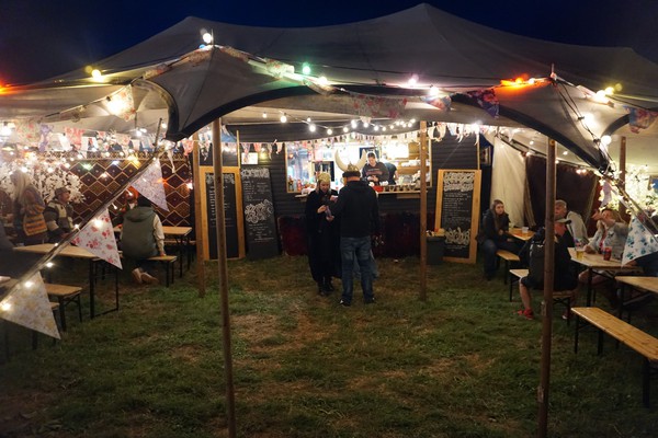 Food stall at night with stretch tent Food stall at night with stretch tent