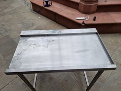 Stainless steel dishwasher feed in table