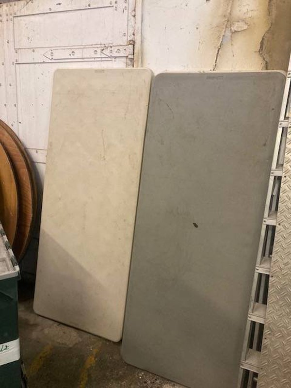 White or grey plastic trestle tables