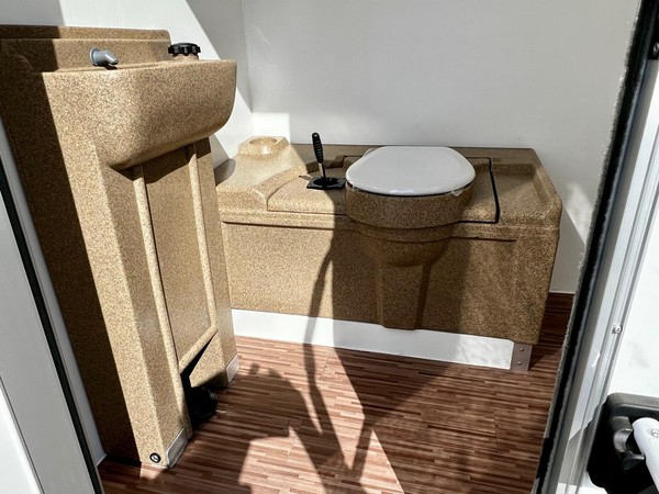 Self contained toilet trailer for sale