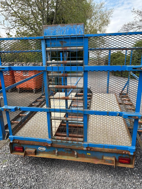 Four plastic toilet transport trailer
