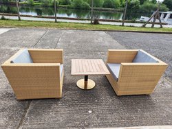 Gold rattan weave chairs with coffee table