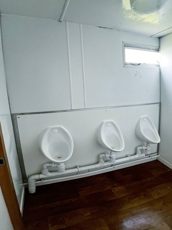 Three urinals Three urinals