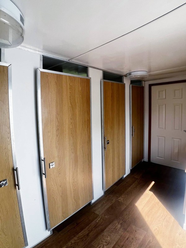 Toilet trailer with wood doors Toilet trailer with wood doors