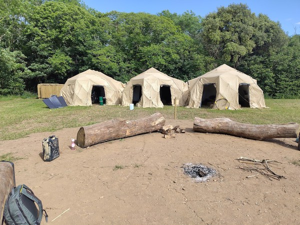 Folding military tents