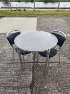 Outdoor round tables and chairs