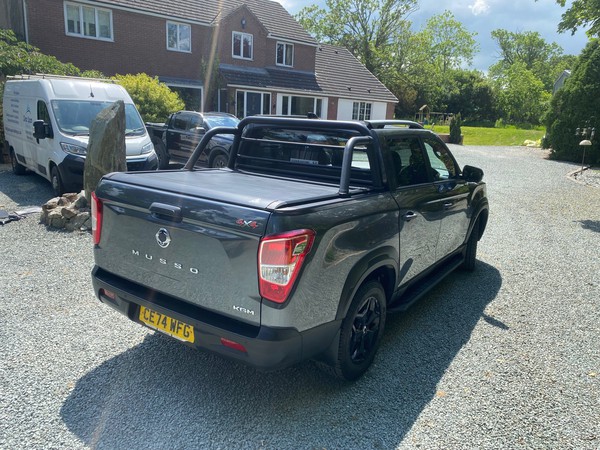 KGM Musso 4 x 4 pickup with load bed cover