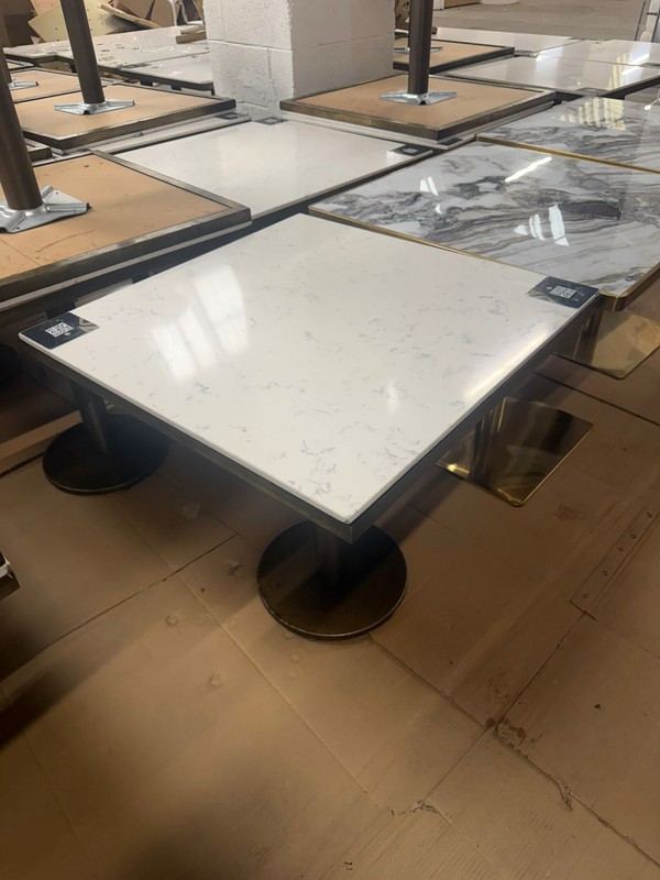 Squat marble cafe / restaurant tables