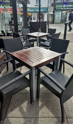 Rattan Style Chairs and Wood Tables