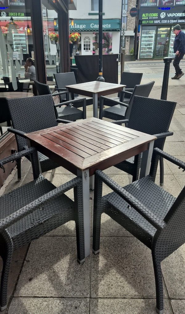 Rattan Style Chairs and Wood Tables