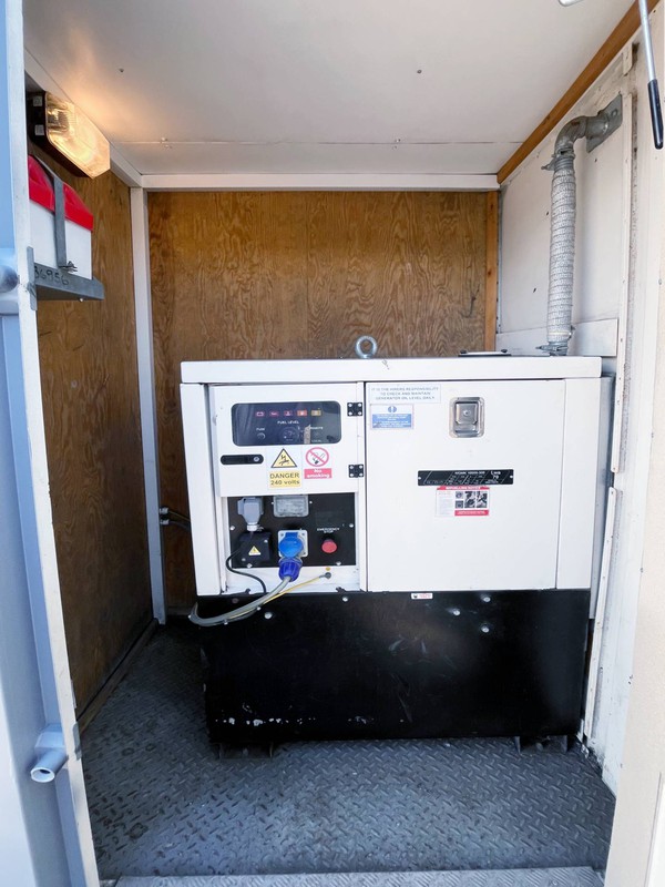 Welfare cabin with generator