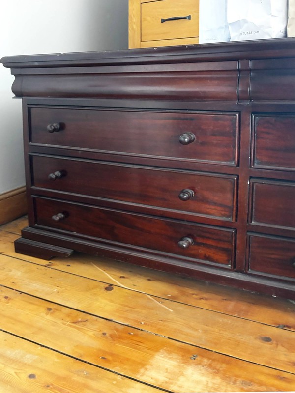 Dark wood chest of drawers