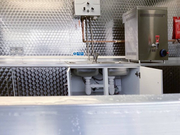 Catering van hot water system