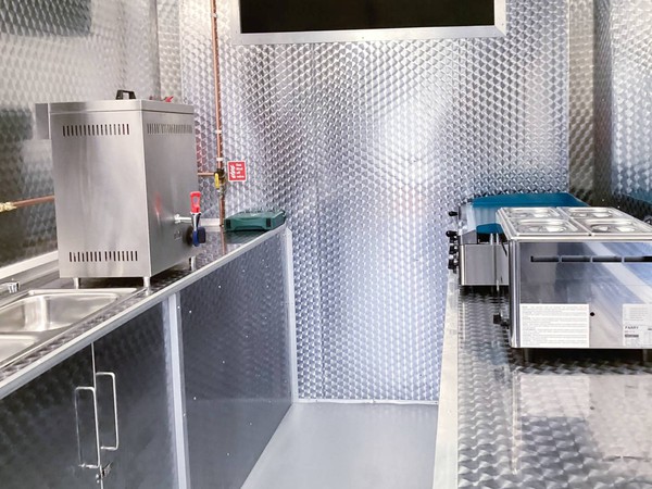 Catering van with brushed stainless steel interior
