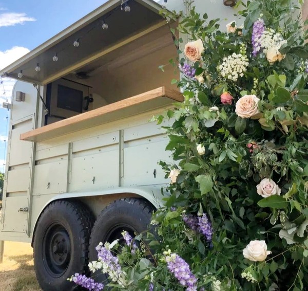 Catering tailer with flowers Catering tailer with flowers